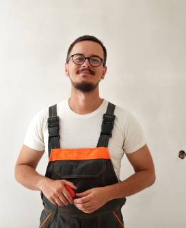 Technician standing in home kitchen